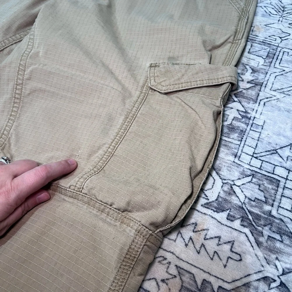 TWO pair of carhartt relaxed fit khakis - 38X30